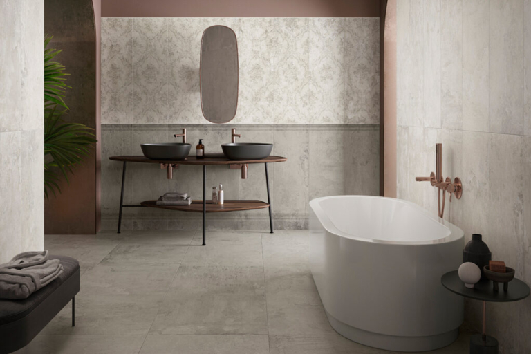 Modern bathroom featuring a freestanding tub, dual sinks, and stylish decor elements.